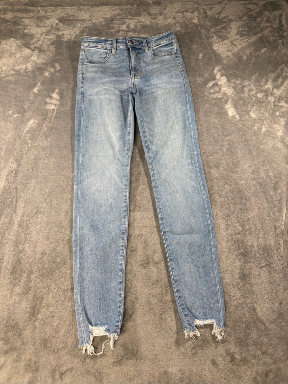 American Eagle Outfitters Light Wash Skinny Jeans with Frayed Hem